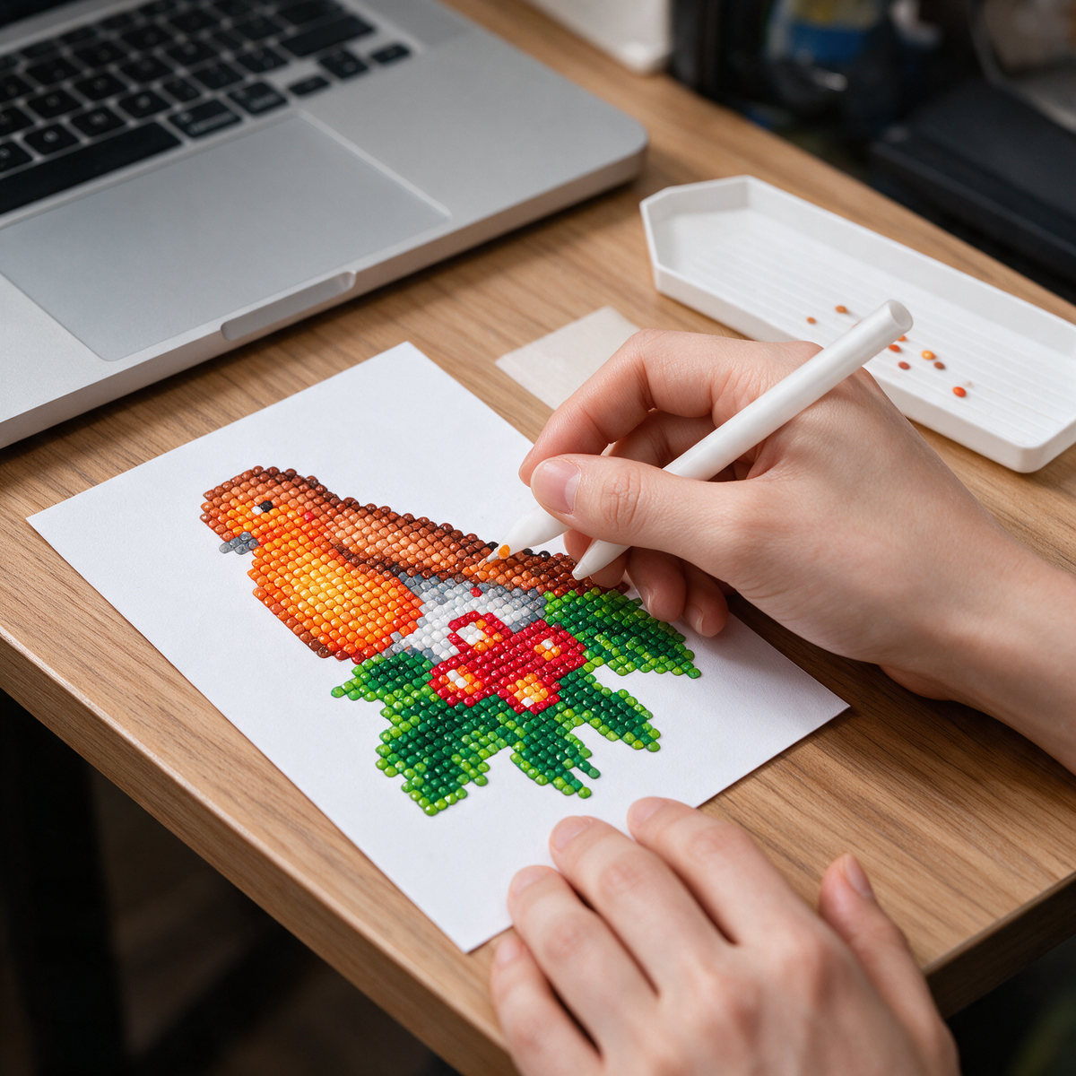 Tropical Flock diamond painting kit: robin canvas on a desk